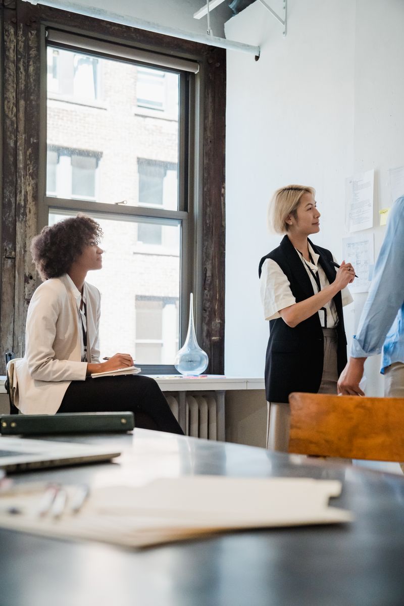Consultants discussing a business workflow